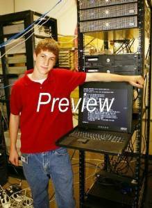 Michael Altfield stands next to a server rack