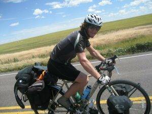 Michael Altfield rides a fully-loaded touring bicycle in the Colorado Eastern Plains